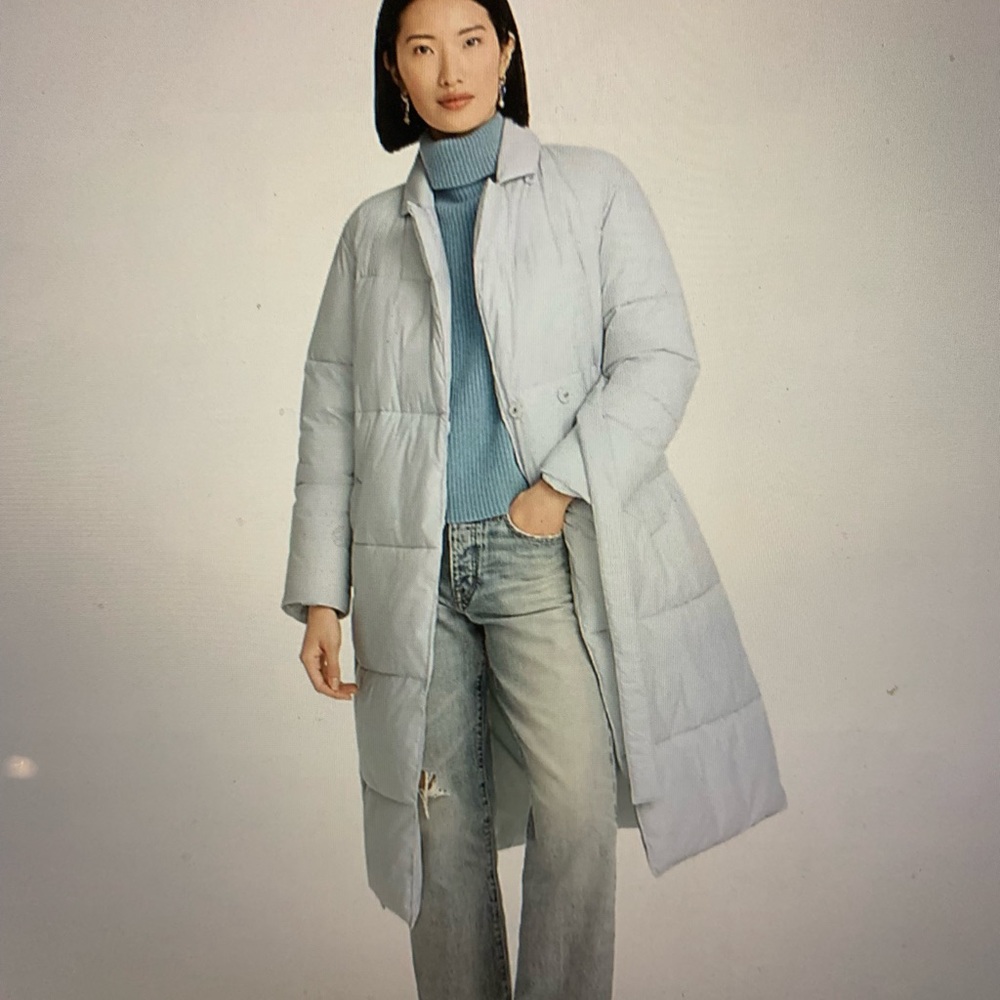 Brand new. With tags. Fits like a L/XL. It is a Medium. Pale Sky color.
